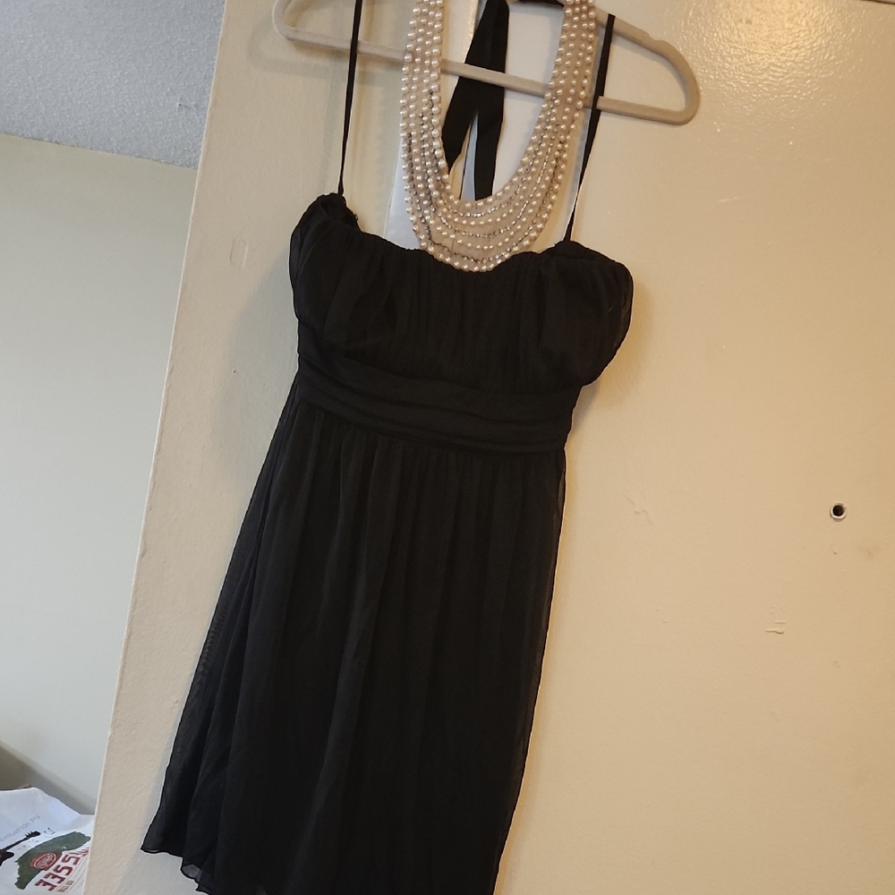 Elegant Black Strapless Dress with Pearl Neckline